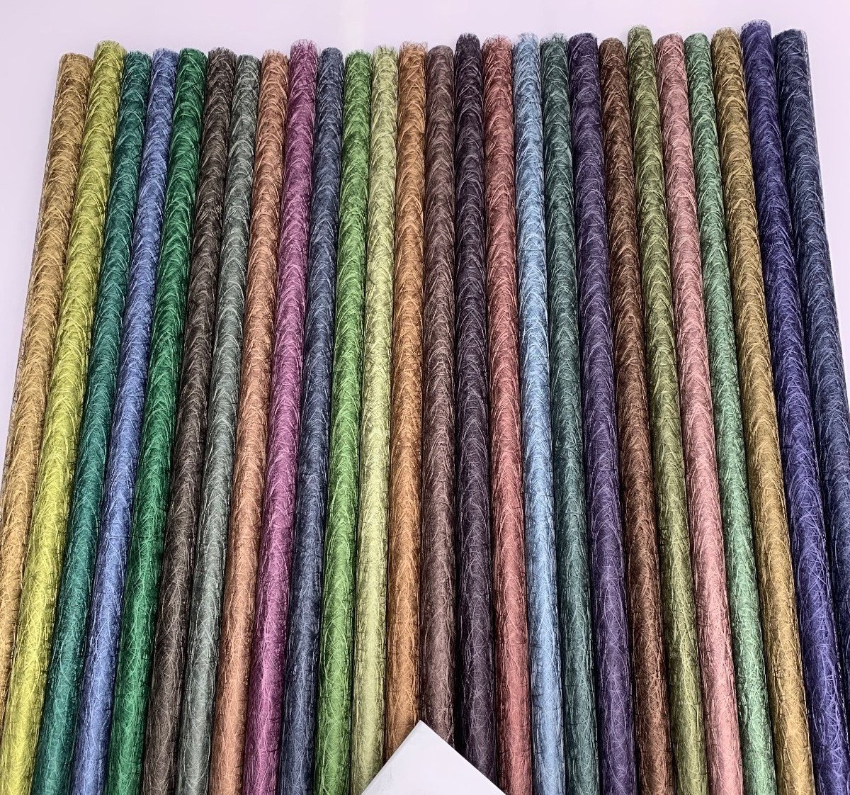 Full colour range of Guoqing decorative material rolls, custom colour matching